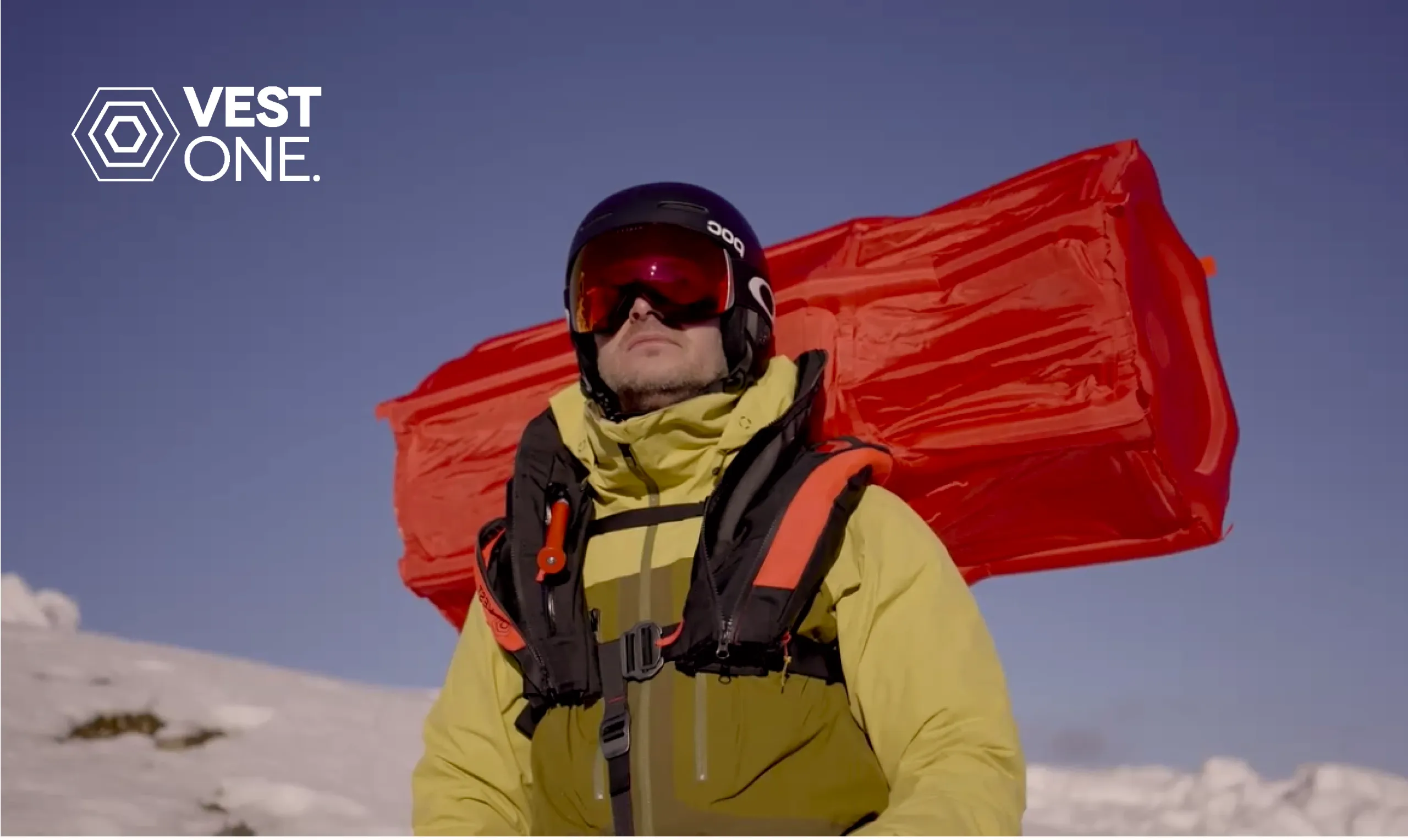A skier wearing the Vest One, the airbag deployed behind
